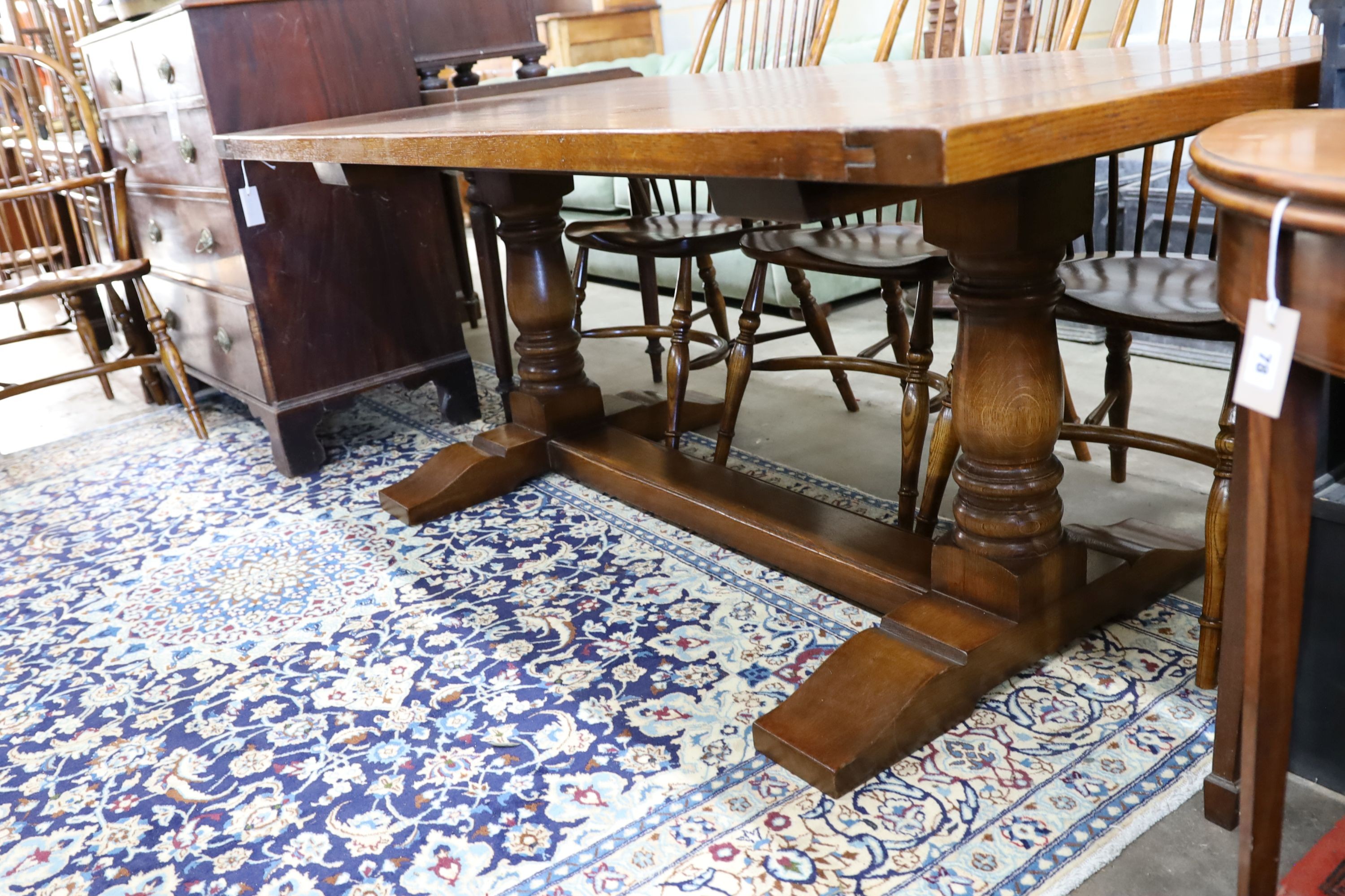 A 17th century style rectangular oak refectory dining table, length 183cm, depth 100cm, height 76cm